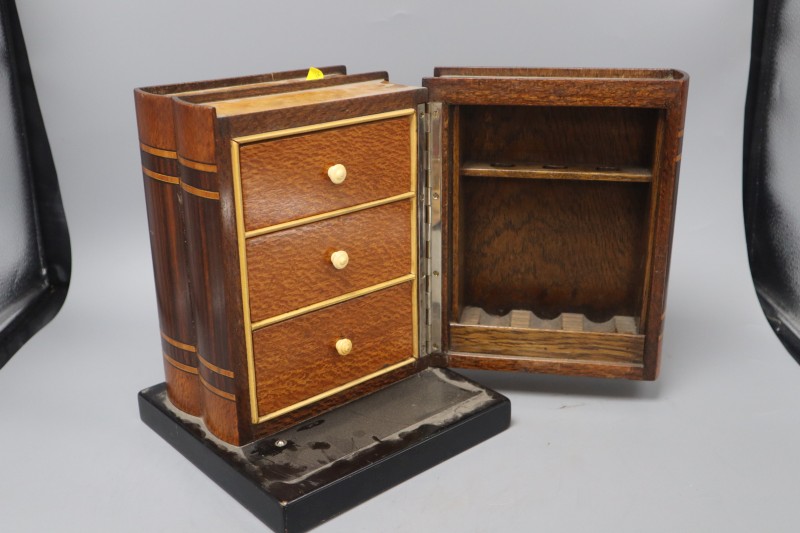 A hardwood book form smokers cabinet, 25.5cm